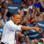 President Obama and Mitt Romney campaign in August: Obama in Leesburg, Va.; Romney in Waukesha, Wis.