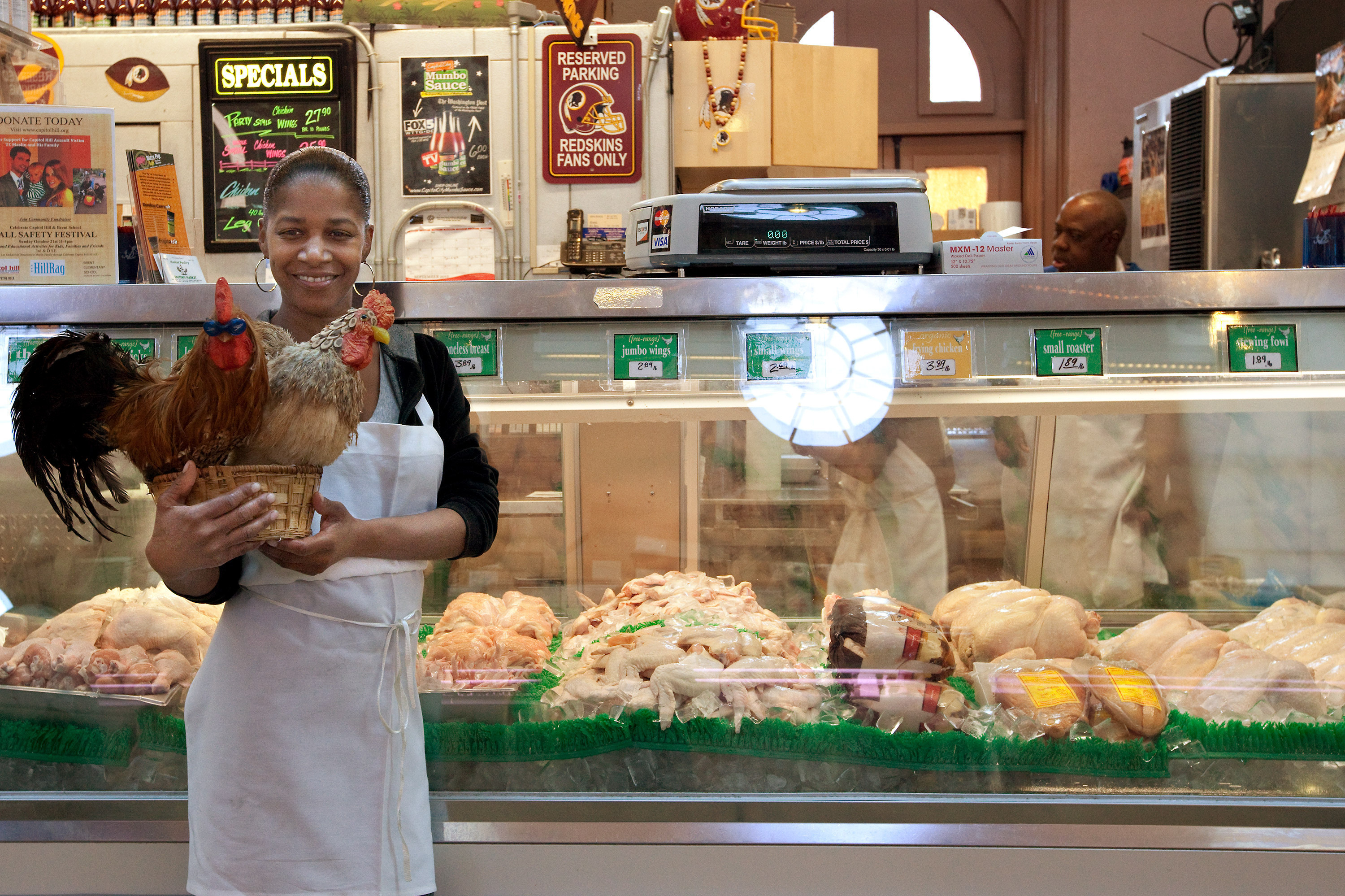 Ivy Maynor is a vendor inside Eastern Market in Washington, D.C. Public markets support local businesspeople who otherwise could be outsold by corporate markets and warehouse establishments. Ivy Maynor is a vendor inside Eastern Market in Washington, D.C. Public markets support local businesspeople who otherwise could be outsold by corporate markets and warehouse establishments.