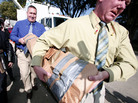 In Roseville, Mich., officials carry away a soil sample taken from under a driveway where a tipster says a body was buried decades ago — raising speculation that it might be Jimmy Hoffa. In Roseville, Mich., officials carry away a soil sample taken from under a driveway where a tipster says a body was buried decades ago — raising speculation that it might be Jimmy Hoffa.