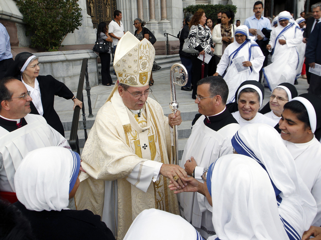 Archbishop John J. Myers stands outside Cathedral Basilica of the Sacred Heart in Newark, N.J. The archbishop has urged followers to assess the presidential candidates for their views on abortion and gay marriage.