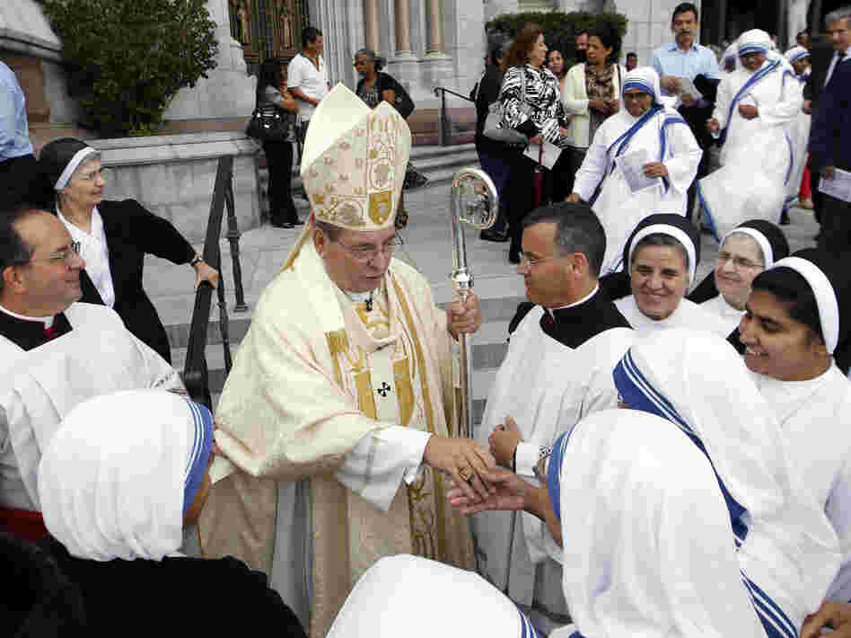 Archbishop John J. Myers stands outside Cathedral Basilica of the Sacred Heart in Newark, N.J. The archbishop has urged followers to assess the presidential candidates for their views on abortion and gay marriage.