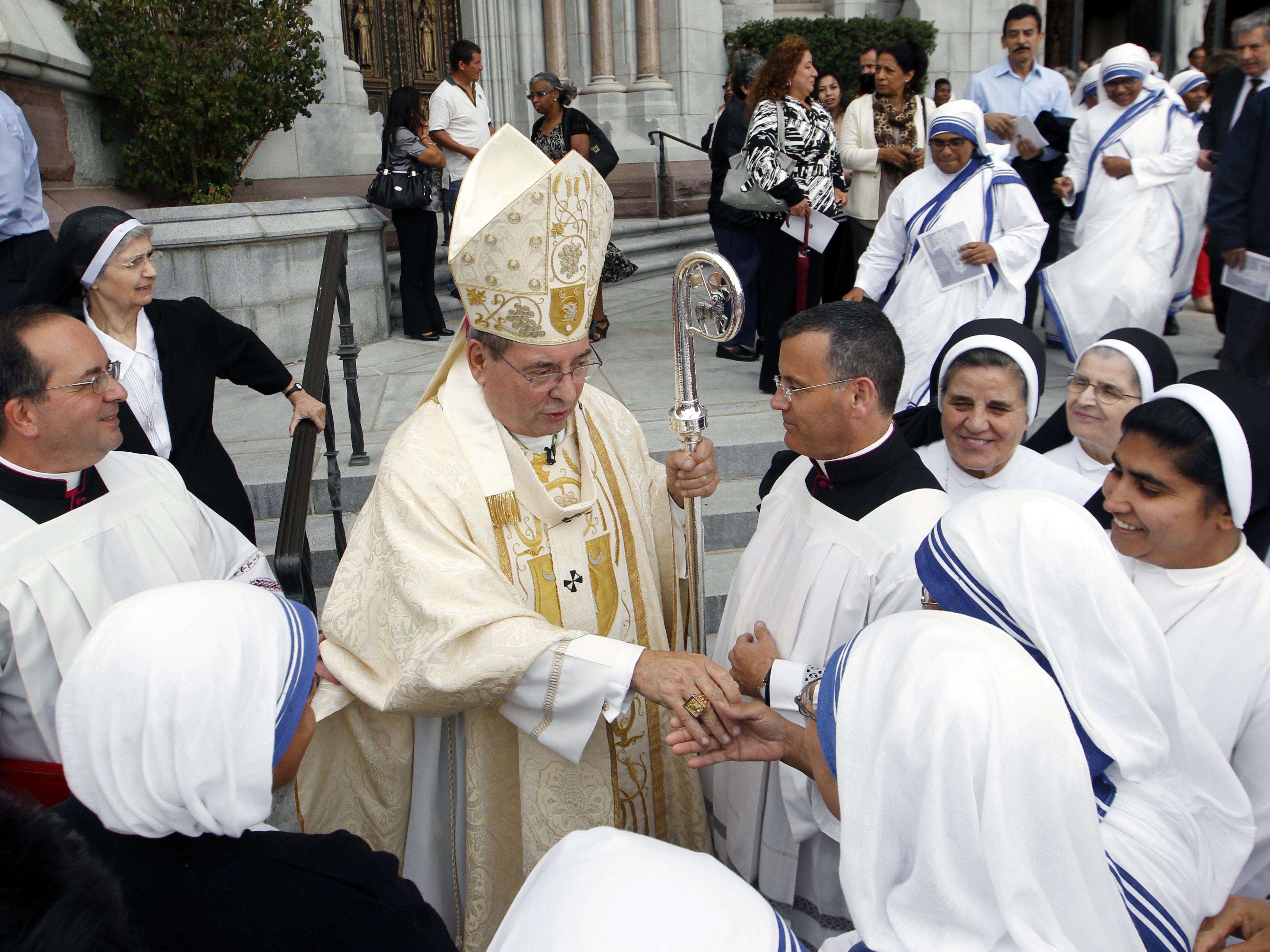 Archbishop John J. Myers stands outside Cathedral Basilica of the Sacred Heart in Newark, N.J. The archbishop has urged followers to assess the presidential candidates for their views on abortion and gay marriage.
