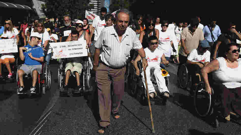 People with disabilities take part in a march against the government's new austerity measures in central Athens on Thursday.