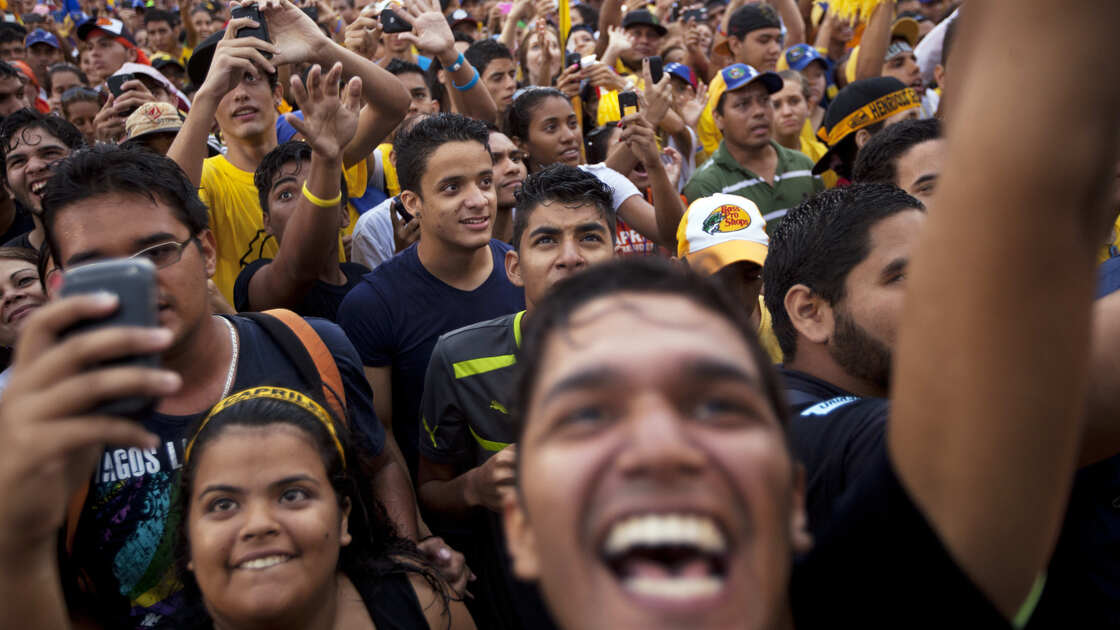 Supporters of opposition presidential candidate Henrique Capriles attend a campaign rally in Valencia, Venezuela, on Thursday. Capriles is running against President Hugo Chavez in the country's Oct. 7 election.