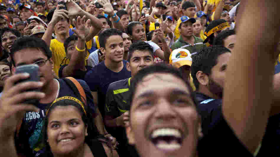 Supporters of opposition presidential candidate Henrique Capriles attend a campaign rally in Valencia, Venezuela, on Thursday. Capriles is running against President Hugo Chavez in the country's Oct. 7 election.