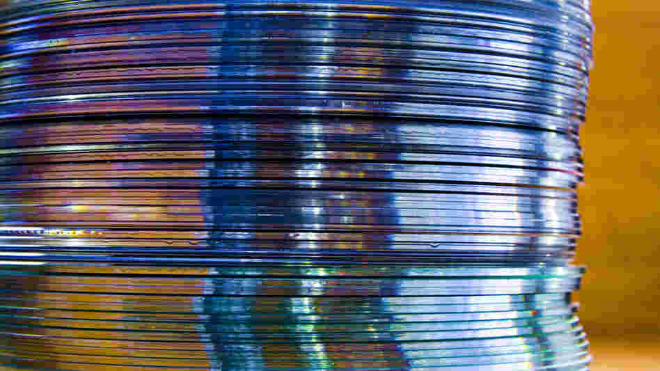 This shot of a stack of CDs on photographer Mike Neilson's desk is captioned on his Flickr page like this: "I have this stack of CDs that I don't know what to do with. I haven't played one in a long time now. Do used CD places still exist? Who would buy CDs, much less USED CDs at this point?"