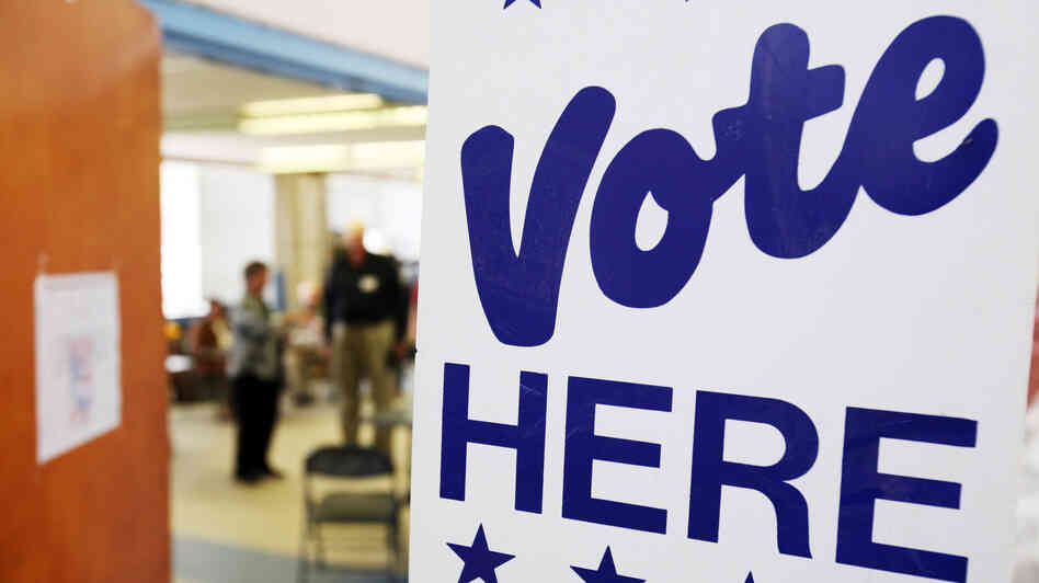 A sign directs voters to polls at a polling station on Nov. 4, 2008, in Shallotte, N.C.