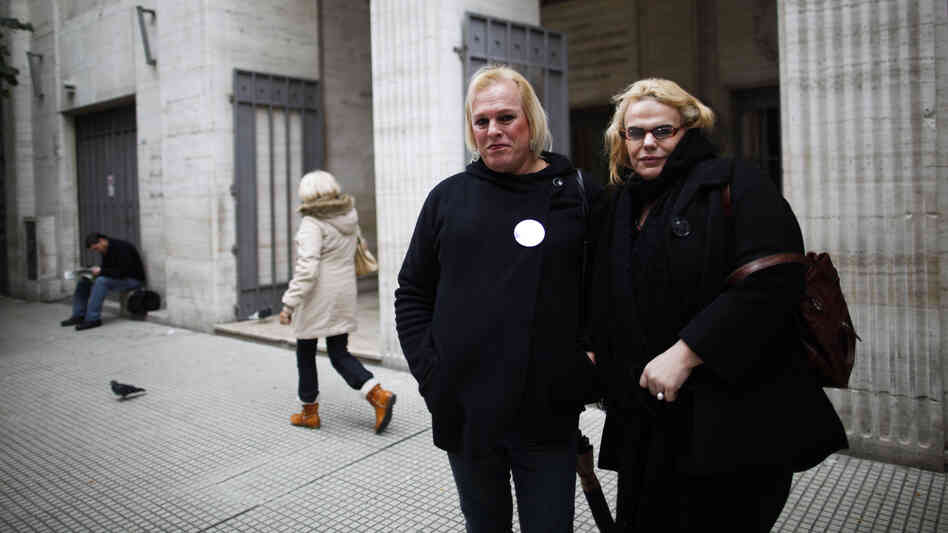 Transsexuals Maiamar Abrodos (right) and Maria Laura Aleman arrive at the civil registry to begin the legal process to change their genders in Buenos Aires, Argentina, in June. Transsexuals Maiamar Abrodos (right) and Maria Laura Aleman arrive at the civil registry to begin the legal process to change their genders in Buenos Aires, Argentina, in June.