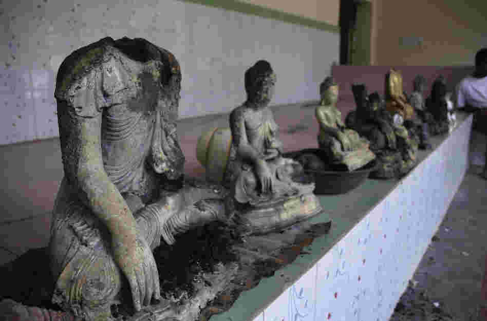 Damaged statues at a Buddhist temple that was torched in Ramu in the coastal district of Cox's Bazar, Bangladesh.