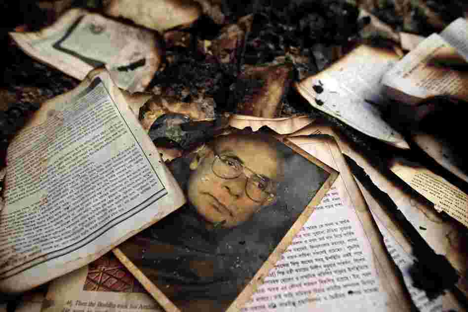 The remains of burned religious books at a Buddhist temple which was torched in an overnight weekend attack in Ramu in the coastal district of Cox's Bazar, Bangladesh.
