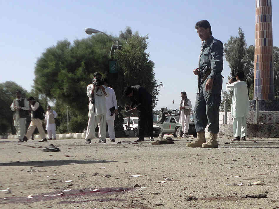 Blood stained the ground at the scene today in Khost, where a suicide bomber struck.