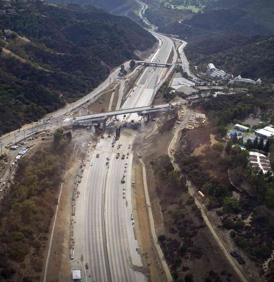 All clear: A section of the 405 freeway in Los Angeles was empty while crews worked over the weekend to demolish the Mulholland Bridge.