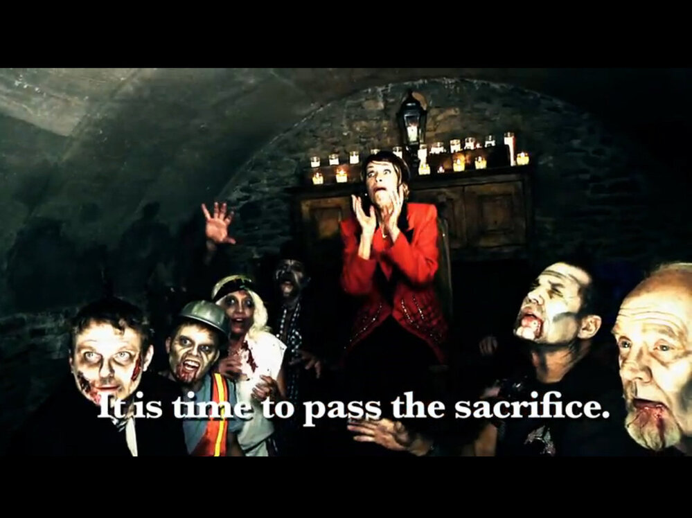 Actors depict Rep. Nancy Pelosi and zombies in a campaign ad by her Republican challenger.