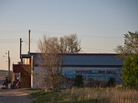 On the south side of Whiteclay, Neb., a crowd gathers outside one of the town's four liquor stores. On the south side of Whiteclay, Neb., a crowd gathers outside one of the town's four liquor stores.