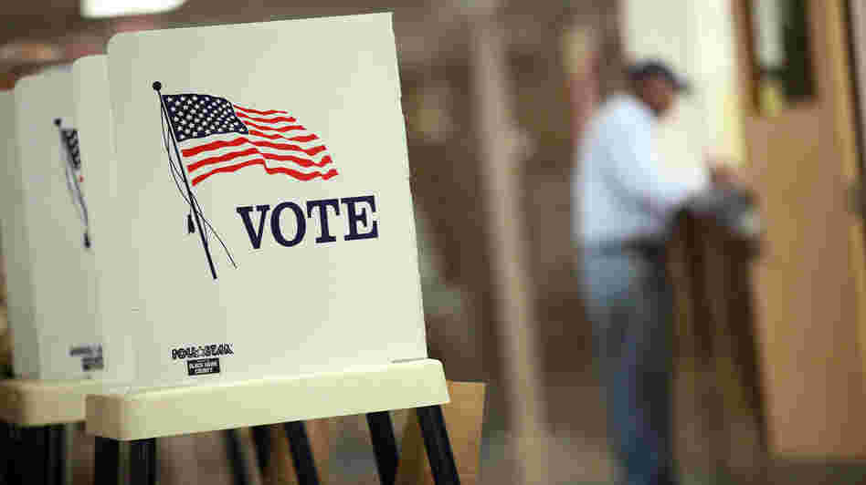 Early voting has begun in the battleground states of Ohio, Virginia and Iowa. Voting booths were set up for early voting Thursday at the Black Hawk County Courthouse in Waterloo, Iowa. Ahead of Wednesday's first presidential debate, an NPR poll finds President Obama with a 7-point lead nationally, but his GOP challenger, Mitt Romney, is within striking distance.