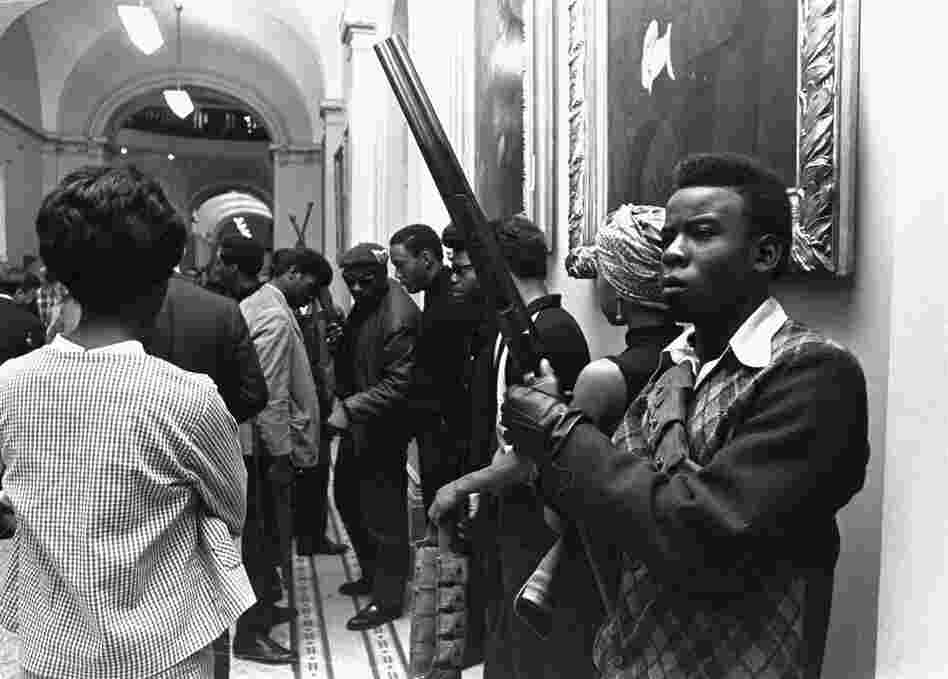 On May 2, 1967, Black Panthers amassed at the Capitol in Sacramento brandishing guns to protest a bill before an Assembly committee restricting the carrying of arms in public. Self-defense was a key part of the Panthers' agenda. This was an early action, a year after their founding.