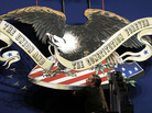 A stagehand positions a backdrop in the Magness Arena at the Daniel L. Ritchie Center for Sports and Wellness, the site of Wednesday's presidential debate, at the University of Denver on Monday. A stagehand positions a backdrop in the Magness Arena at the Daniel L. Ritchie Center for Sports and Wellness, the site of Wednesday's presidential debate, at the University of Denver on Monday.