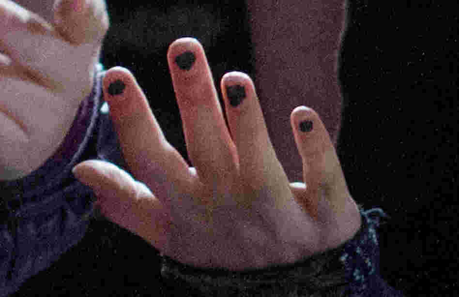 Nail close-up showing ragged manicure Nail close-up showing ragged manicure