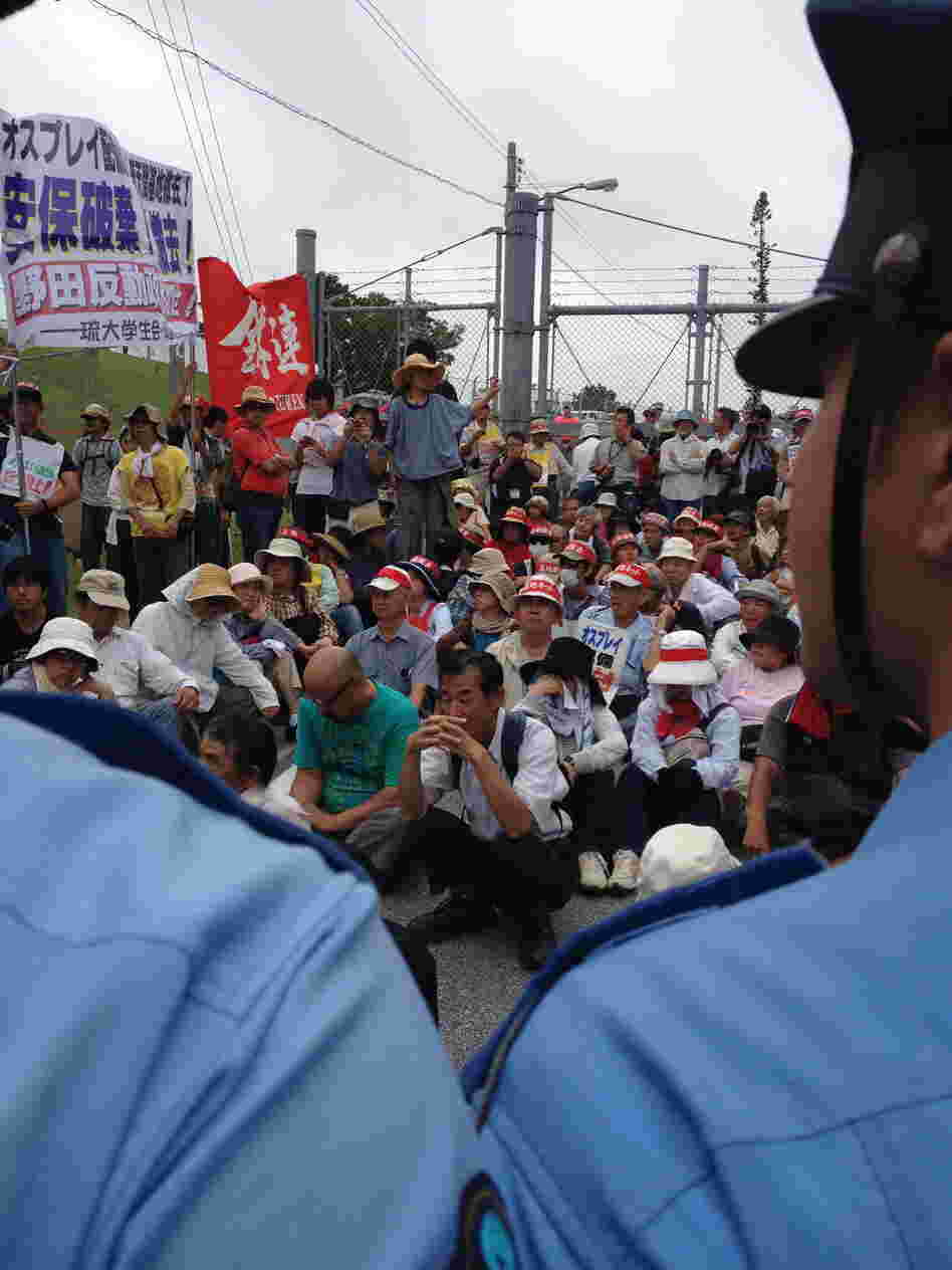 Protesters block an entrance to U.S. Marine Corps Air Station Futenma in Ginowan, Japan.