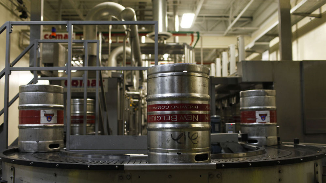 Beer is processed at the New Belgium Brewery in Fort Collins, Colo. The brewery has embraced sustainability, making efforts to produce some of its own energy.