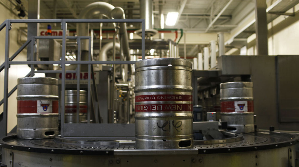 Beer is processed at the New Belgium Brewery in Fort Collins, Colo. The brewery has embraced sustainability, making efforts to produce some of its own energy.