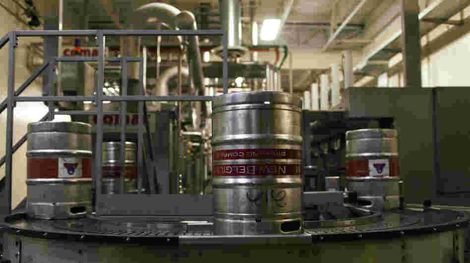 Beer is processed at the New Belgium Brewery in Fort Collins, Colo. The brewery has embraced sustainability, making efforts to produce some of its own energy.