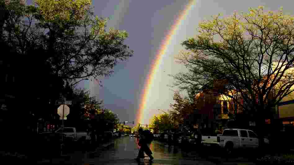 A rare thunderstorm produced hail, torrential rain and a double rainbow in downtown Fort Collins, Colo., last month.