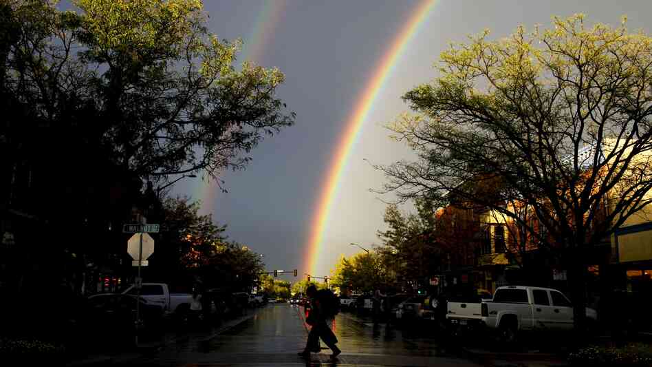 A rare thunderstorm produced hail, torrential rain and a double rainbow in downtown Fort Collins, Colo., last month.