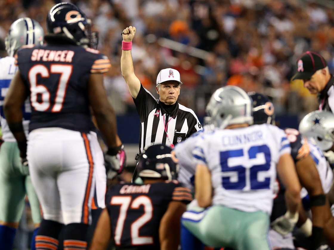 Referee Walt Anderson makes a call in the Chicago Bears game against the Dallas Cowboys Monday, ending the NFL's first full slate of games with its regular officials.