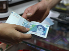 A 20,000 rial banknote, which today was worth less than 60 cents. A 20,000 rial banknote, which today was worth less than 60 cents.