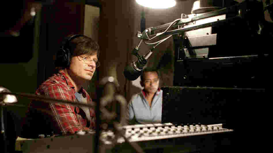 DJ Davis McAlary (Steve Zahn) interviews John Boutte about an unreleased recording of his.