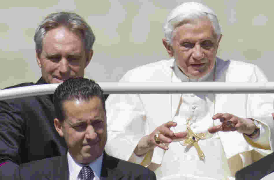Pope Benedict XVI and his former butler, Paolo Gabriele (center), are shown at the Vatican in this file photo. The pope's private secretary, Georg Gaenswein, is on the left.