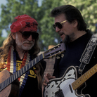 Willie Nelson (left) and Waylon Jennings, members of the country supergroup The Highwaymen, perform at a concert in Central Park in 1993. Willie Nelson (left) and Waylon Jennings, members of the country supergroup The Highwaymen, perform at a concert in Central Park in 1993.