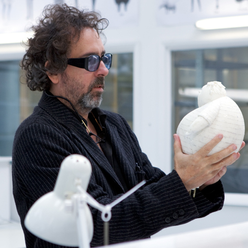 Tim Burton, seen here with a stop-motion puppet, has made several films using the time-intensive style, including The Nightmare Before Christmas, Corpse Bride and his latest film, Frankenweenie.