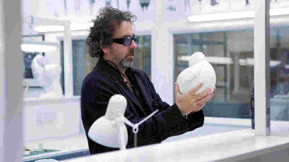 Tim Burton, seen here with a stop-motion puppet, has made several films using the time-intensive style, including The Nightmare Before Christmas, Corpse Bride and his latest film, Frankenweenie. Tim Burton, seen here with a stop-motion puppet, has made several films using the time-intensive style, including The Nightmare Before Christmas, Corpse Bride and his latest film, Frankenweenie.