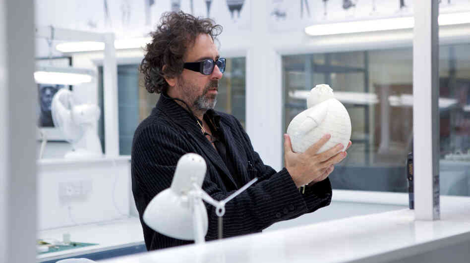 Tim Burton, seen here with a stop-motion puppet, has made several films using the time-intensive style, including The Nightmare Before Christmas, Corpse Bride and his latest film, Frankenweenie. Tim Burton, seen here with a stop-motion puppet, has made several films using the time-intensive style, including The Nightmare Before Christmas, Corpse Bride and his latest film, Frankenweenie.
