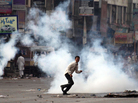 A demonstrator reacts after Pakistani policemen fire tear gas during a protest against power cuts in Karachi in June. Pakistan suffers from a massive energy crisis, one of several factors contributing to the country's severe economic troubles. A demonstrator reacts after Pakistani policemen fire tear gas during a protest against power cuts in Karachi in June. Pakistan suffers from a massive energy crisis, one of several factors contributing to the country's severe economic troubles.