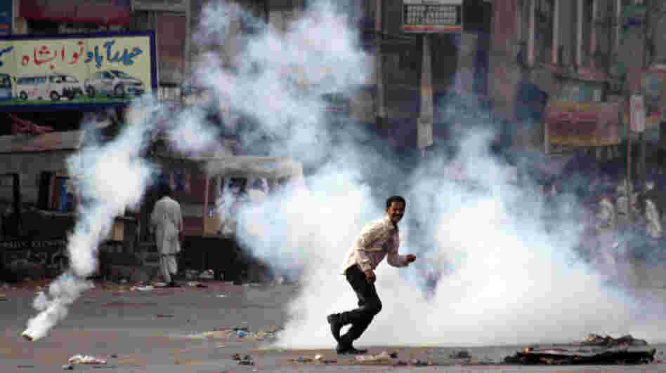 A demonstrator reacts after Pakistani policemen fire tear gas during a protest against power cuts in Karachi in June. Pakistan suffers from a massive energy crisis, one of several factors contributing to the country's severe economic troubles. A demonstrator reacts after Pakistani policemen fire tear gas during a protest against power cuts in Karachi in June. Pakistan suffers from a massive energy crisis, one of several factors contributing to the country's severe economic troubles.