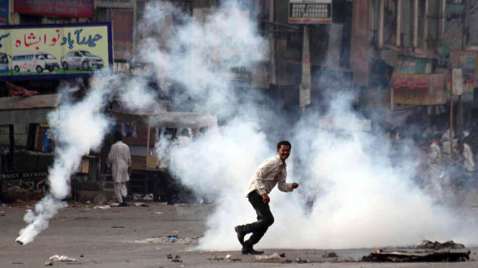 A demonstrator reacts after Pakistani policemen fire tear gas during a protest against power cuts in Karachi in June. Pakistan suffers from a massive energy crisis, one of several factors contributing to the country's severe economic troubles. A demonstrator reacts after Pakistani policemen fire tear gas during a protest against power cuts in Karachi in June. Pakistan suffers from a massive energy crisis, one of several factors contributing to the country's severe economic troubles.