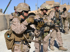Female Marines unload their rifles after a patrol with Afghan soldiers in Helmand province in June. The Marine Corps leadership has started an experiment to determine whether female Marine lieutenants have what it takes to become infantry officers and lead on the battlefield. Female Marines unload their rifles after a patrol with Afghan soldiers in Helmand province in June. The Marine Corps leadership has started an experiment to determine whether female Marine lieutenants have what it takes to become infantry officers and lead on the battlefield.