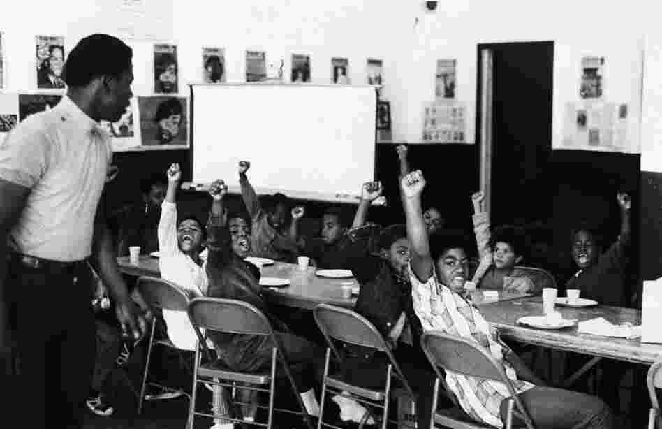 The Panthers also ran a number of social service programs in cities across the country, including free breakfasts for students, health clinics and schools. Here, students give the black power salute at a San Francisco Black Panther "liberation school" in 1969.