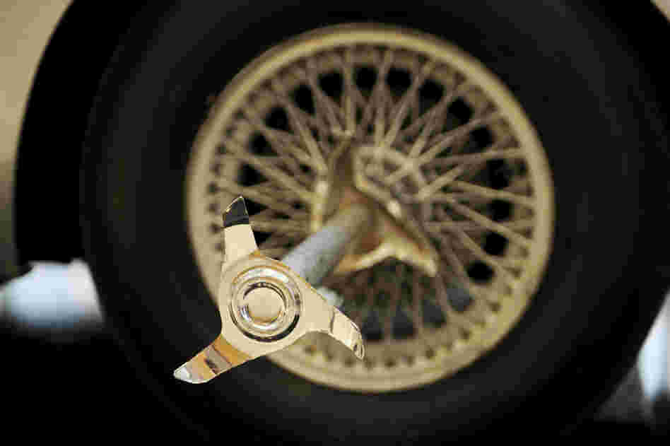 A tire-splitter is attached to the Aston Martin DB5 driven by actor Sean Connery in Goldfinger and Thunderball, part of a 2010 auction at Sotheby's in New York.