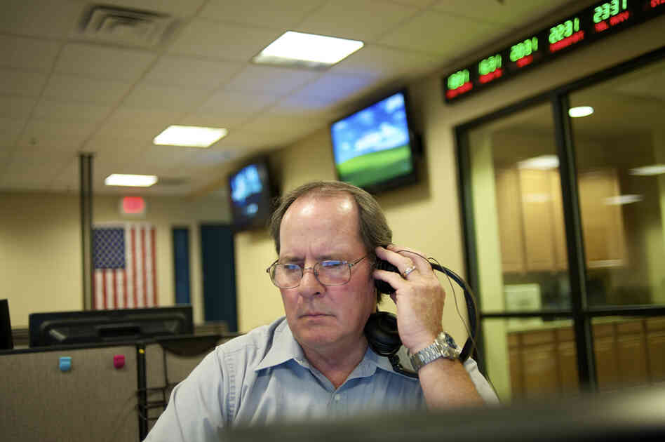 At a fusion center in Las Vegas workers like Daniel Burns, a program coordinator, analyze suspicious activity reports.