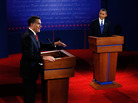 Mitt Romney makes his point as President Obama listens during Wednesday's debate in Denver. Mitt Romney makes his point as President Obama listens during Wednesday's debate in Denver.