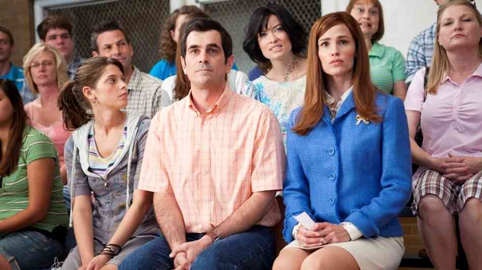 Iowans Laura (Jennifer Garner, front right) and Bob Pickler (Ty Burrell) fight to remain the first couple of state-fair butter sculpting. Iowans Laura (Jennifer Garner, front right) and Bob Pickler (Ty Burrell) fight to remain the first couple of state-fair butter sculpting.