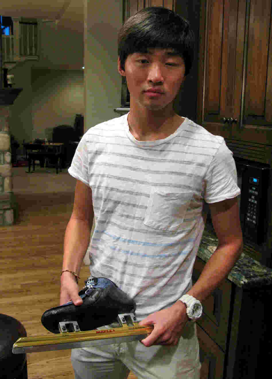Olympic speedskater Simon Cho holds a short track skate that is similar to the one he sabotaged at an international meet last year. Cho first openly described what he did and why in an interview with NPR this week at his attorney's home outside Salt Lake City.