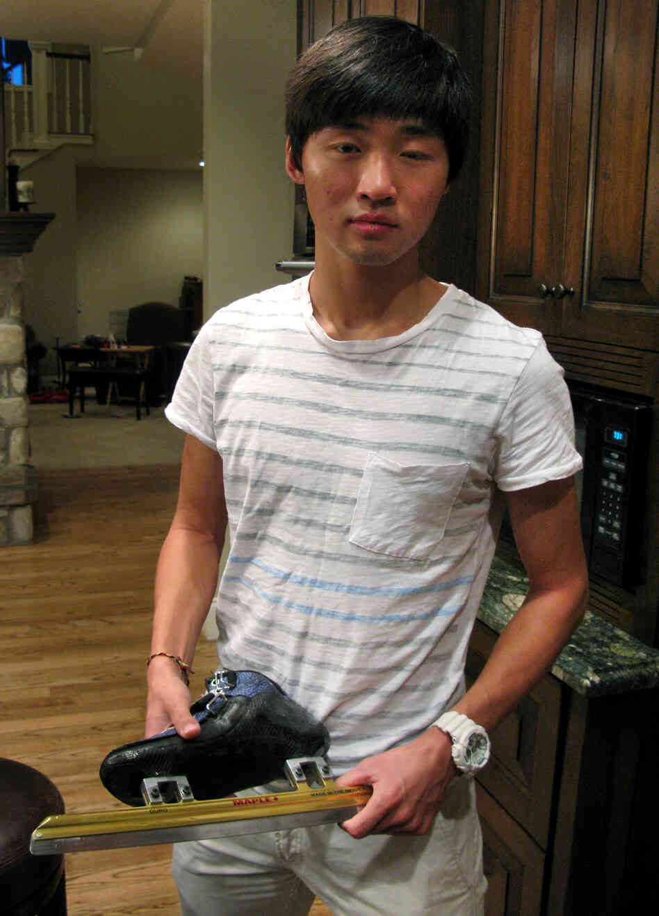 Olympic speedskater Simon Cho holds a short track skate that is similar to the one he sabotaged at an international meet last year. Cho first openly described what he did and why in an interview with NPR this week at his attorney's home outside Salt Lake City.