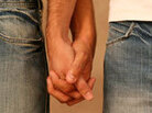 Men holding hands. Men holding hands.