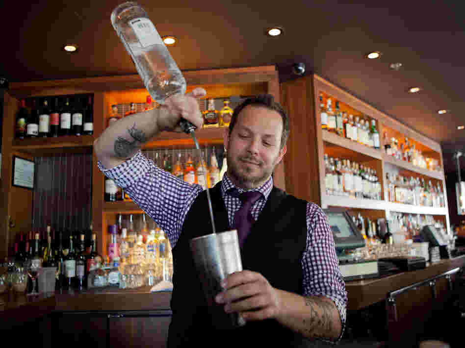 Bar Dupont bartender Brian Collins pours us a cold one.