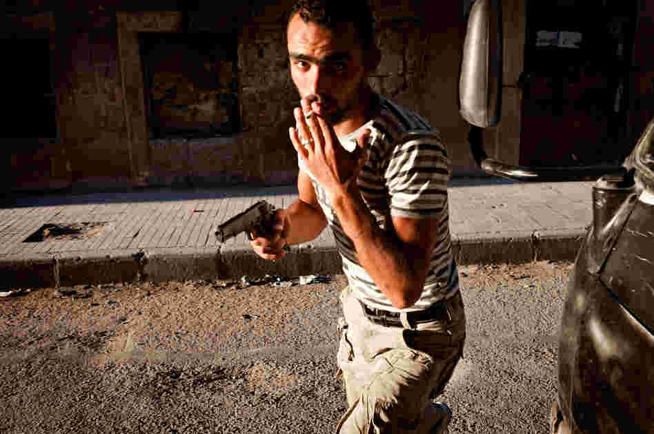 A Free Syrian Army fighter in the Bustan Pasha neighborhood of Aleppo, Syria, Aug. 21.